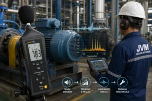 Sound level meter mengukur suara mesin industri dengan tampilan grafik spektrum frekuensi dan teknisi melakukan monitoring kondisi mesin.